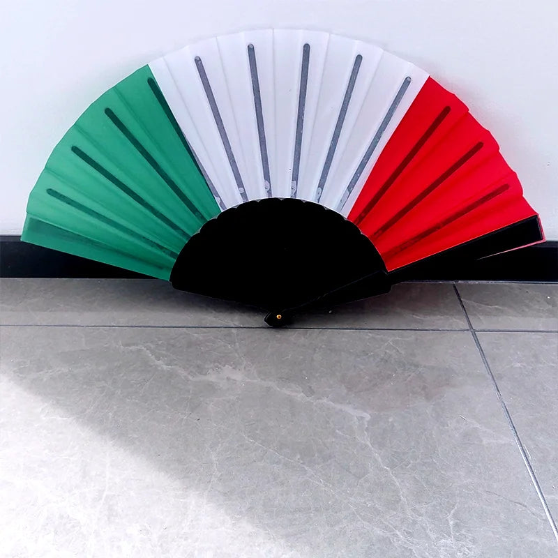 Handheld folding fan featuring the colors of the Italian flag, green white and red.