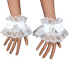 White ruffled lace wrist cuffs with bowknot accents worn on a hand.
