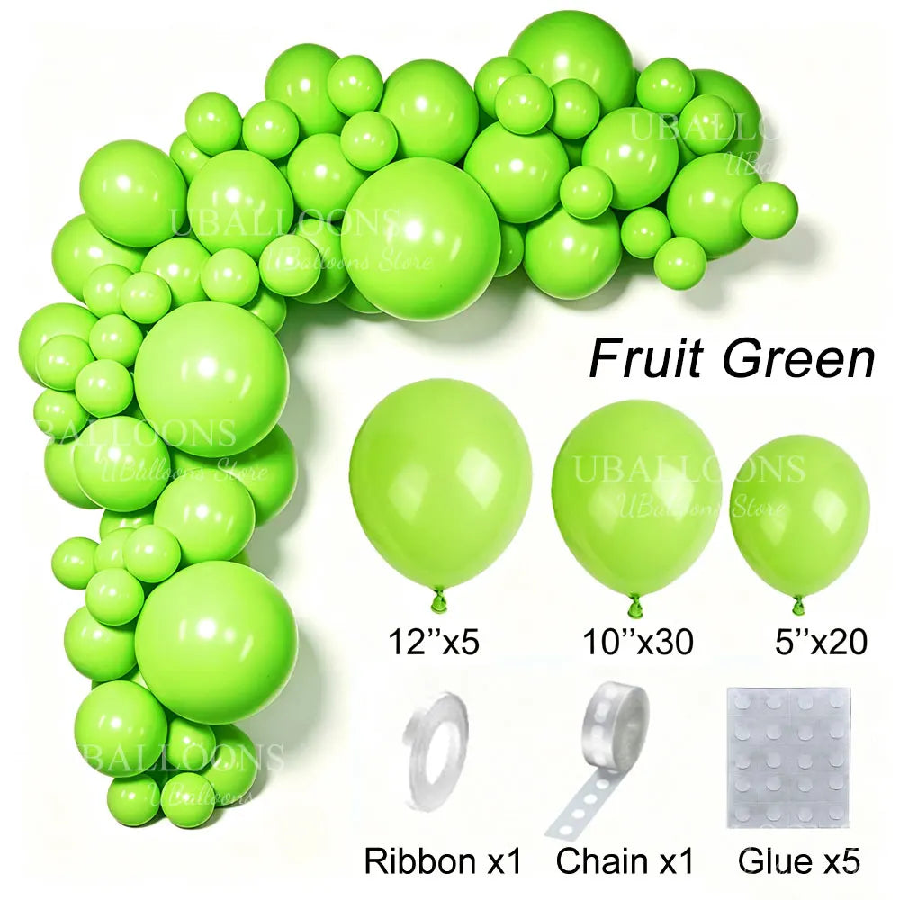 A green latex balloon garland kit showing various sizes of balloons, ribbon, chain, and glue.
