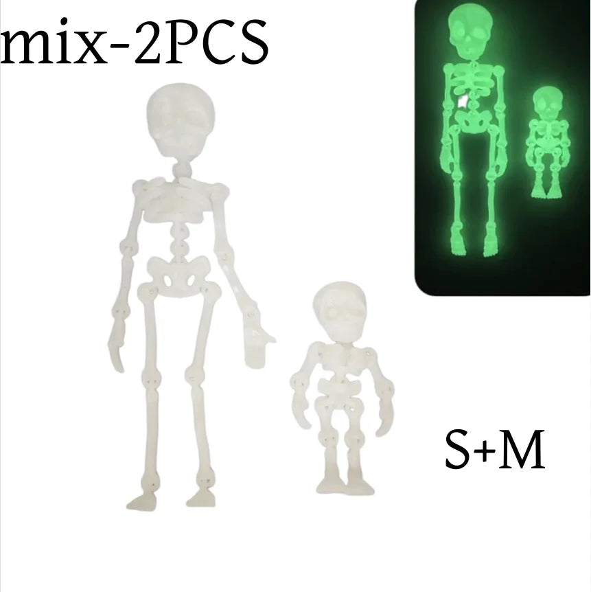 A set of mix-2PCS poseable magnetic skull fridge magnets shown alongside a full human skeleton and a smaller skeleton.