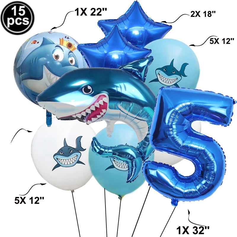 A collection of blue shark foil balloons in various sizes including 15 pieces, with a large 32 inch balloon visible.