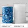 A blue silicone mold for Christmas decorations showing a detailed Santa figure and snowflakes.