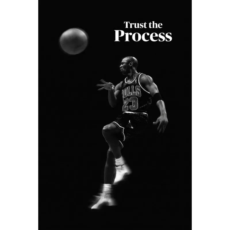 A black and white image of a basketball player in mid-action, with the text Trust the Process above him.