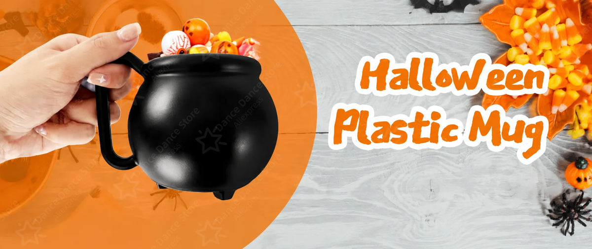 A black plastic witch cauldron mug filled with Halloween treats is being held over an orange plate.