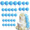 A set of light blue foam cake toppers on sticks, arranged in various sizes and colors.