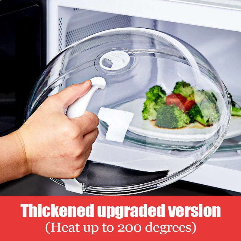 A hand is holding a transparent microwave splatter guard with a steam vent and handle over a plate of food.