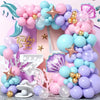 A colorful balloon garland arch featuring pink, purple, and blue balloons with starfish accents for a mermaid theme.