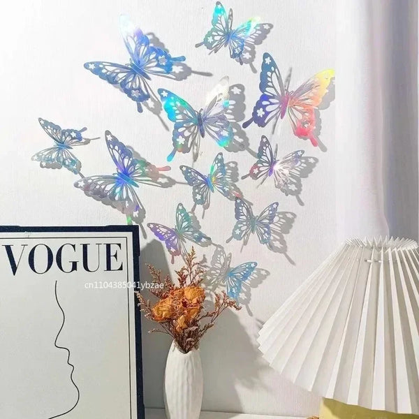 A set of 3D hollow butterfly wall stickers in gold and silver metallic decor displayed on a white wall.