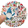 A circular sticker pack featuring various cute Christmas dwarf and Santa decorations in red, green, and blue.