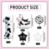 A set of cow print balloons including a large balloon, a black balloon, and a white balloon for a party.