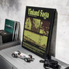 A poster featuring the title Vinland Saga in green and black tones displayed on a shelf.