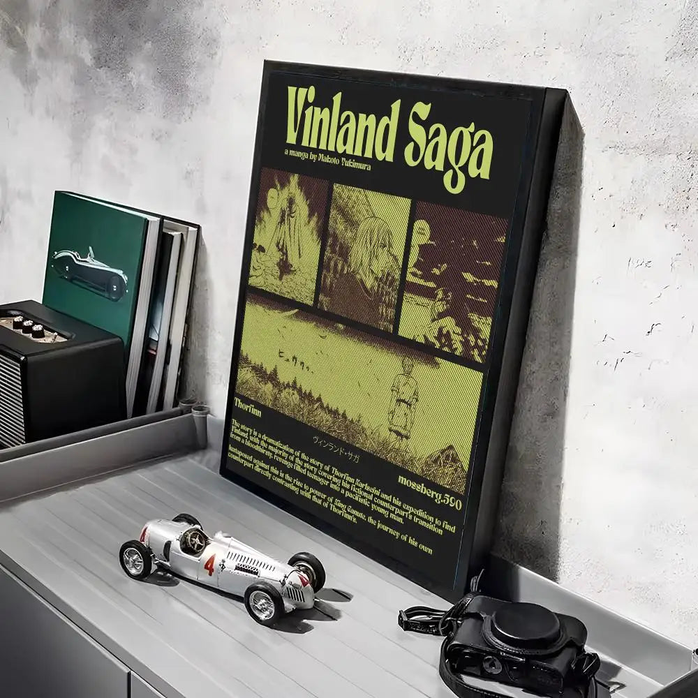 A poster featuring the title Vinland Saga in green and black tones displayed on a shelf.