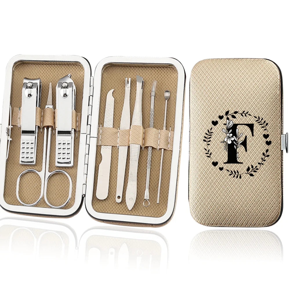 An open leather case displaying an 8-piece stainless steel manicure and pedicure kit with various tools.