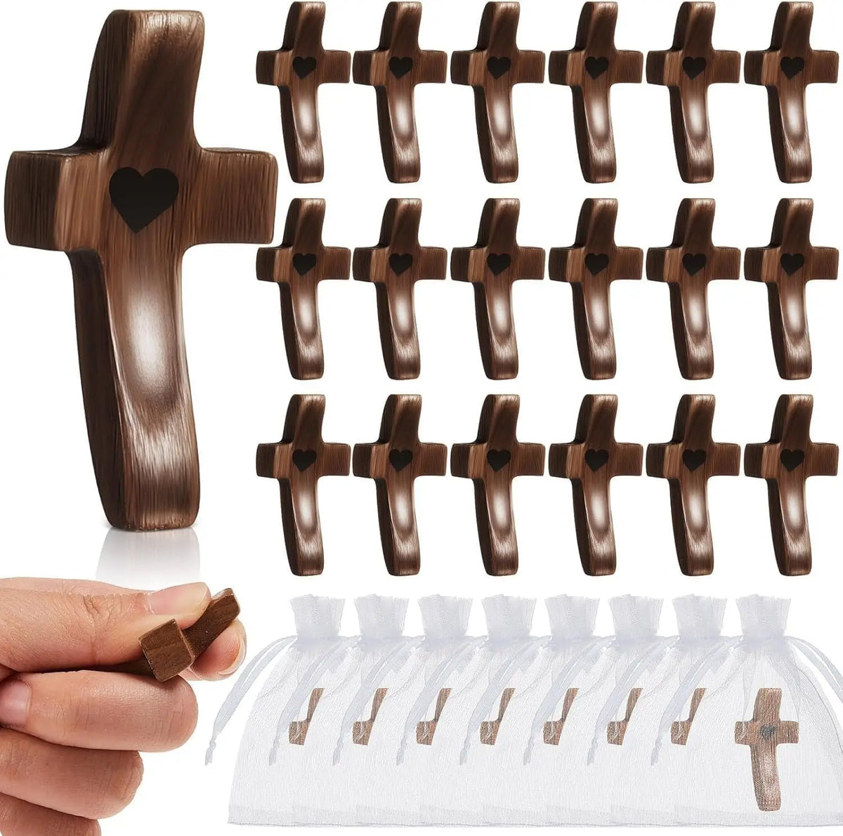 A set of small wooden cross charms for stress relief and meditation, shown next to a hand.