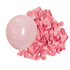 A pile of pink crinkled latex balloons for parties and celebrations.