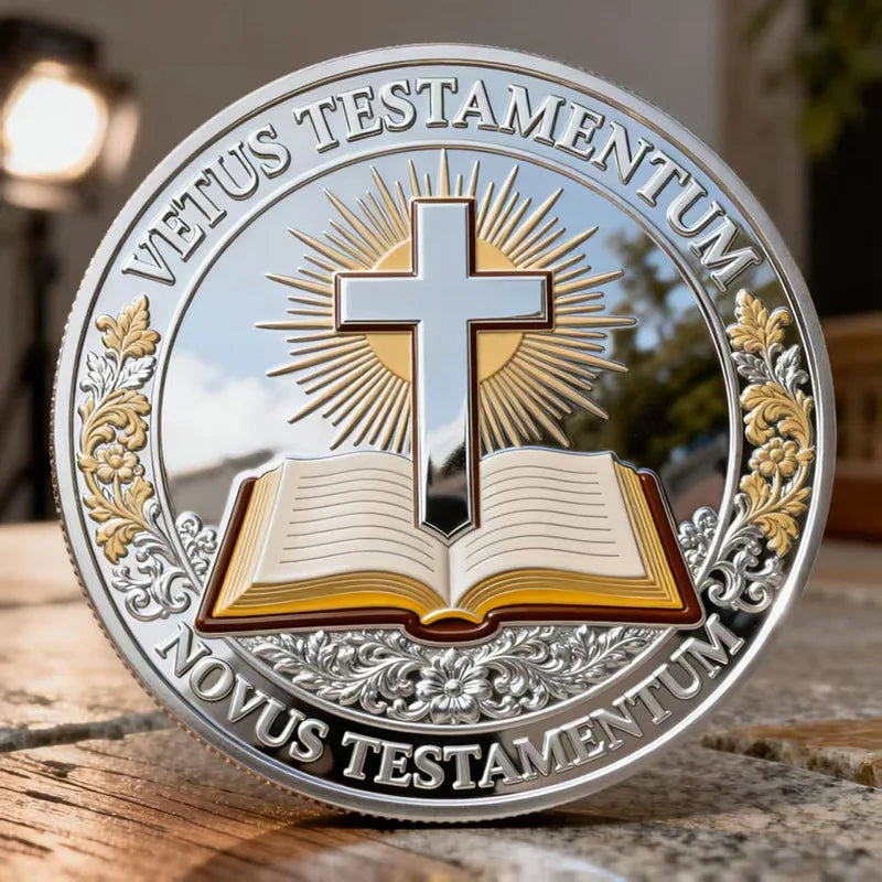 A silver commemorative coin featuring a cross design and Latin text on the obverse.