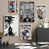 A collection of black and white anime wall art featuring characters from Jujutsu Kaisen including Yuji Itadori and Sukuna