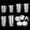 A set of clear disposable plastic cups with straws arranged in a row.