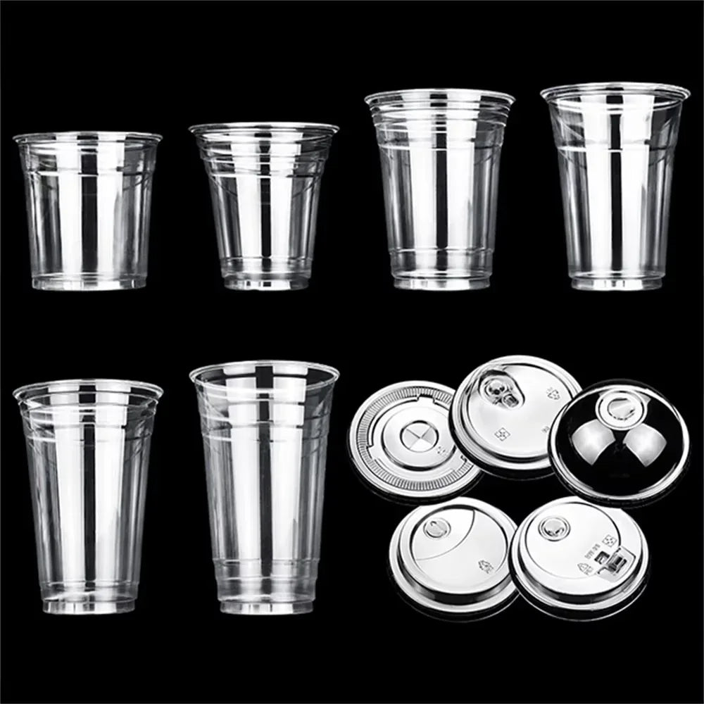 A set of clear disposable plastic cups with straws arranged in a row.