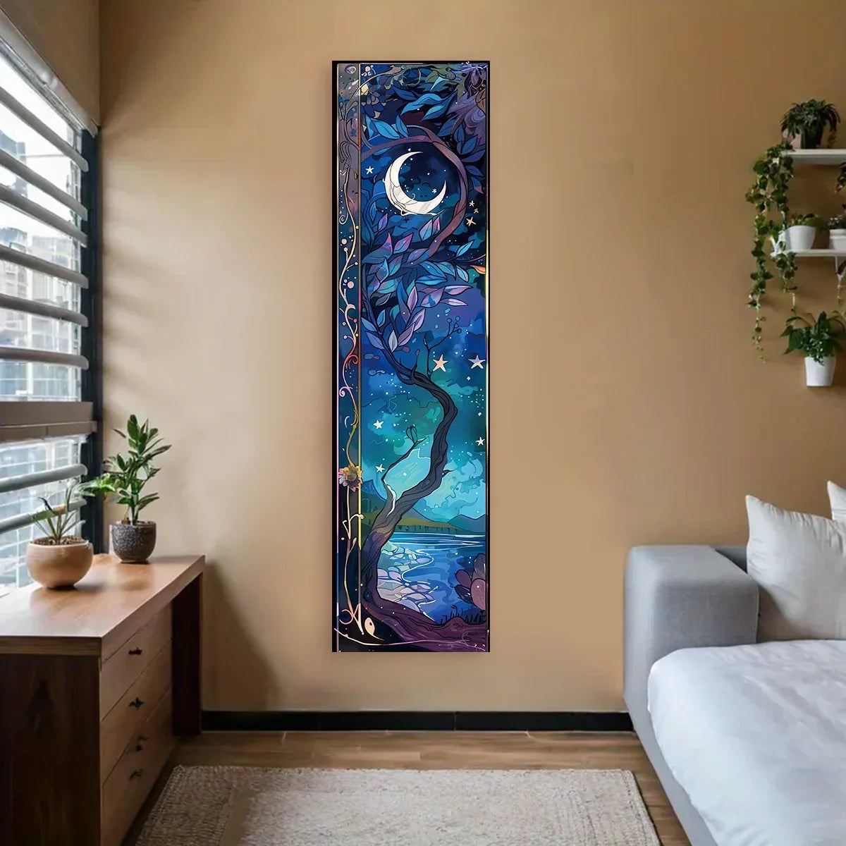 A vertical tapestry featuring a blue and purple tree with a crescent moon and stars against a dark background.