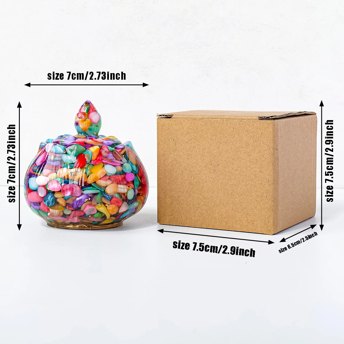 A natural crystal healing bowl filled with colorful stones, shown next to its cardboard packaging.
