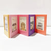 A set of five decorative photo frame magnets in pastel colors pink, yellow, purple, and orange arranged horizontally.