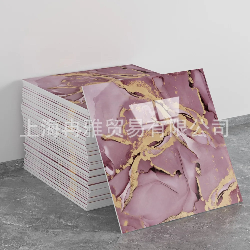 Rolls of faux marble 3D self-adhesive wall tiles in pink and gold marble pattern