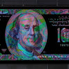 A close-up of a 100 dollar Federal Reserve Note featuring Benjamin Franklin, printed on a black background.