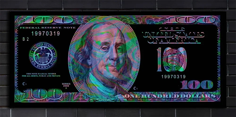 A close-up of a 100 dollar Federal Reserve Note featuring Benjamin Franklin, printed on a black background.