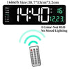 A digital wall clock display showing 14:40 and 16 degrees, with a remote control visible below.