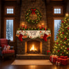 A rustic fireplace mantel decorated for autumn with a wreath of greenery, seasonal garlands, and red stockings.