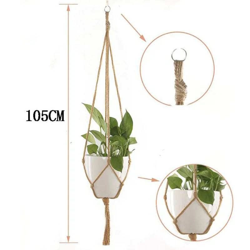 Handmade macrame plant hanger with a woven rope and a potted green plant hanging from a wooden rod.