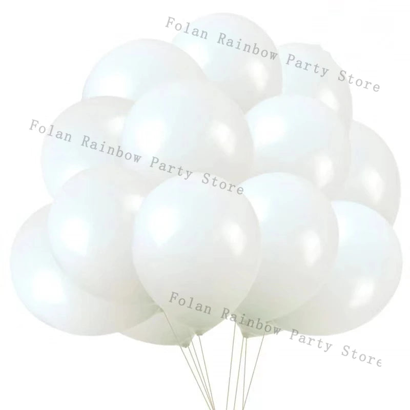 A cluster of white matte latex balloons tied together, ready for a party decoration.