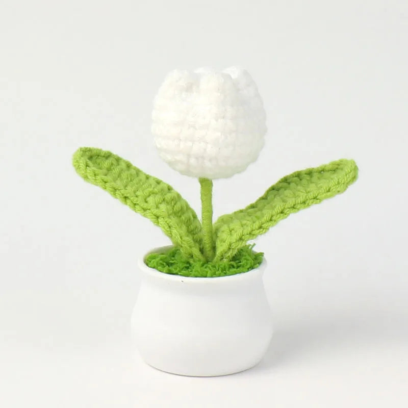 Hand woven crochet white flower in a green pot