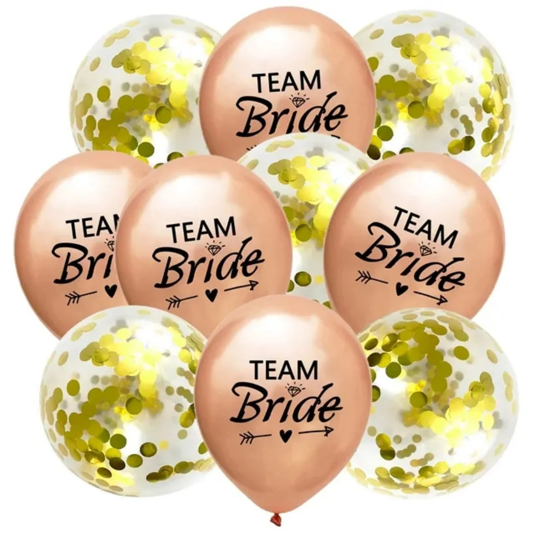 A pack of ten rose gold latex confetti balloons with gold glitter and black lettering reading Team Bride