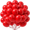 A bunch of red latex party balloons clustered together.