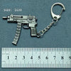 A silver alloy gun model miniature keychain featuring a realistic replica of a firearm attached to a chain.