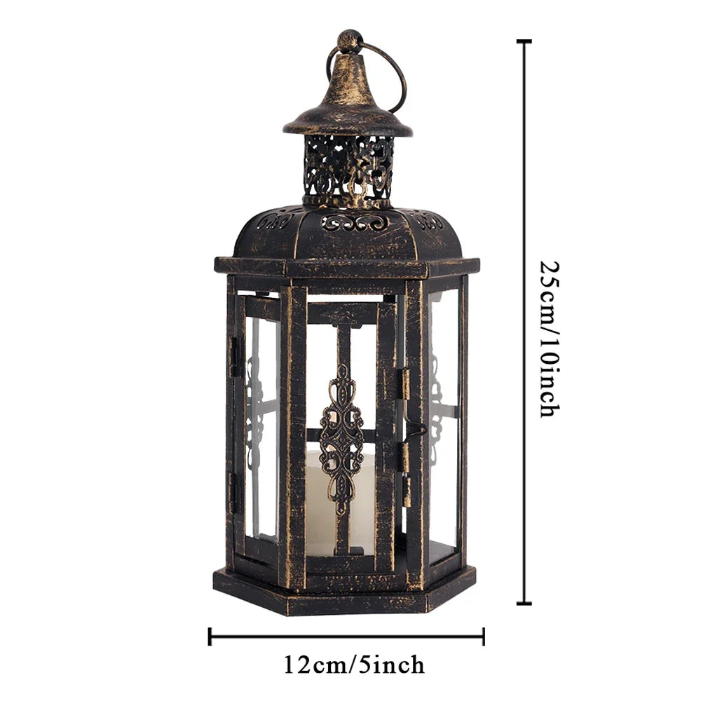 A vintage Nordic iron candle lantern with glass panes, featuring a decorative top and dark finish.