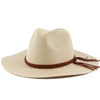 A beige straw sun hat with a brown braided band and leather ties.