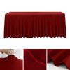A smooth, deep red stretch rectangle tablecloth draped over a table.
