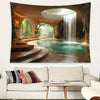 A large painting depicting a tropical cave with an arched opening, lush greenery, and a flowing waterfall cascading into a po