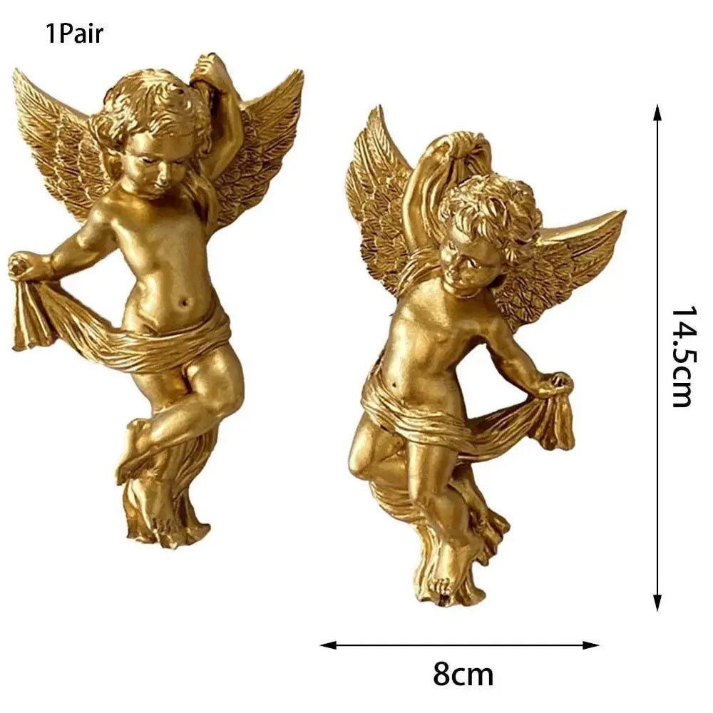 A pair of golden cherub angels wall decor featuring winged infants, measuring 14.5 cm in height and 8 cm in width.
