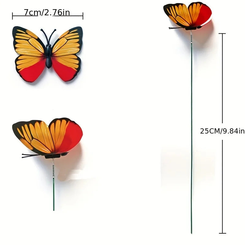 A set of decorative butterfly garden stakes in orange and red colors, shown with measurements.