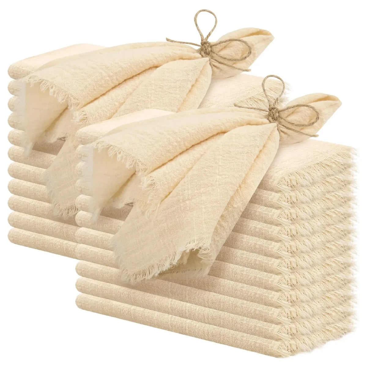 A stack of ten handcrafted fringed cotton napkins in a natural beige color.