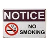 A rectangular metal sign with a white background and maroon text that reads NOTICE NO SMOKING