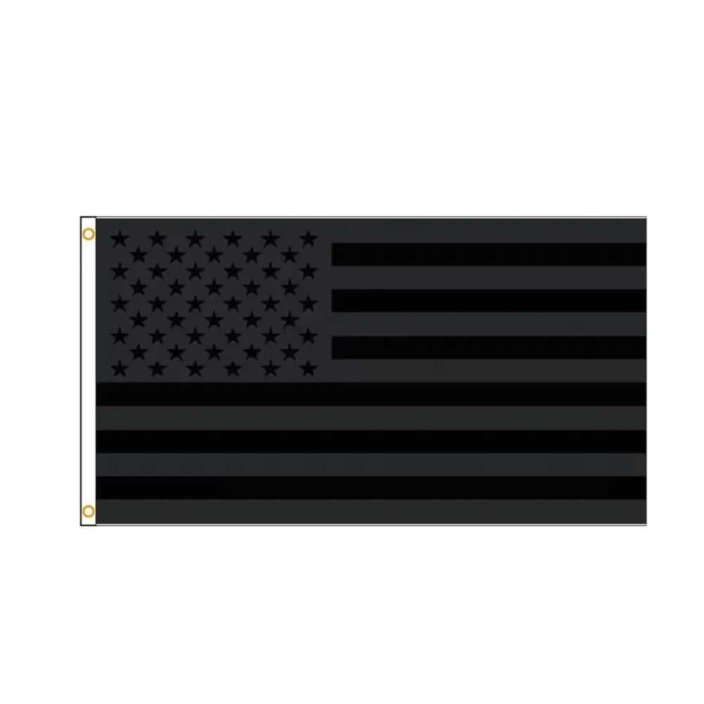 A large black flag with white stars on the left and horizontal black stripes on the right.
