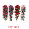 A display of artificial silk rose flowers in shades of red and pink arranged in vertical garlands.