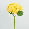 A cluster of bright yellow artificial hydrangea flowers on a green stem and leaf.