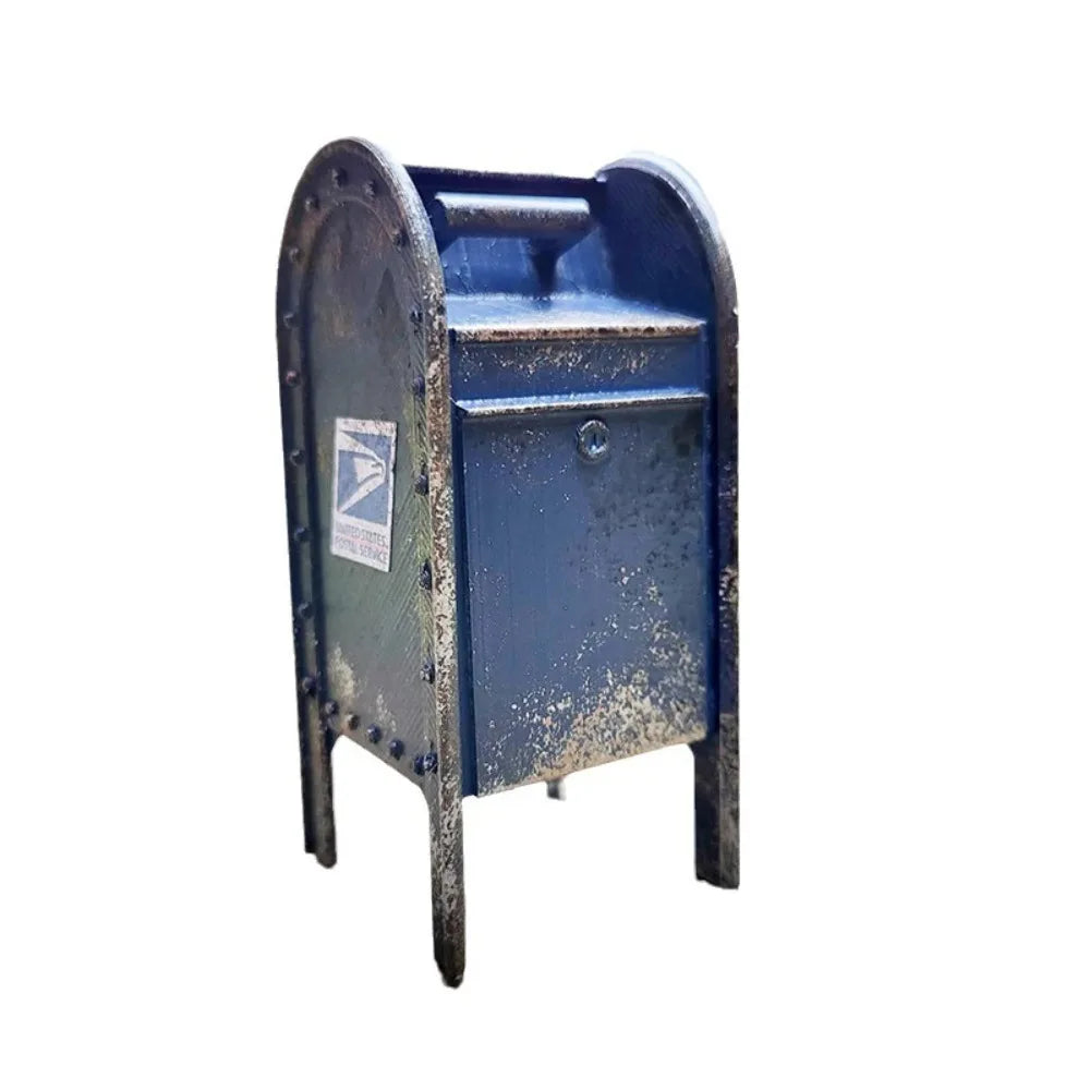 A vintage-style miniature payphone with a weathered blue and dark green finish.