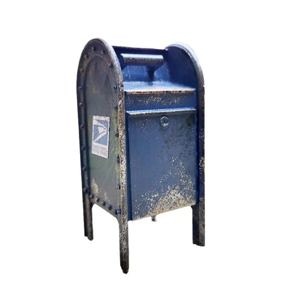 A vintage-style miniature payphone with a weathered blue and dark green finish.
